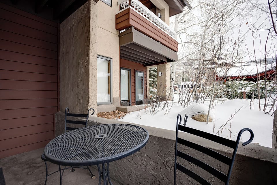 Step onto your private balcony where winter mountain views create a peaceful backdrop for morning coffee or evening relaxation.