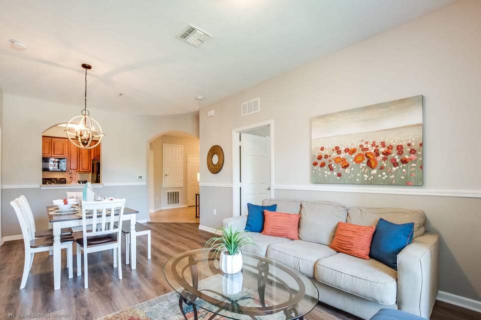 The kitchen, dining, and living areas come together in seamless harmony. A space where culinary delights, shared meals, and relaxation intertwine, creating an atmosphere of unity and elegance for all to enjoy.