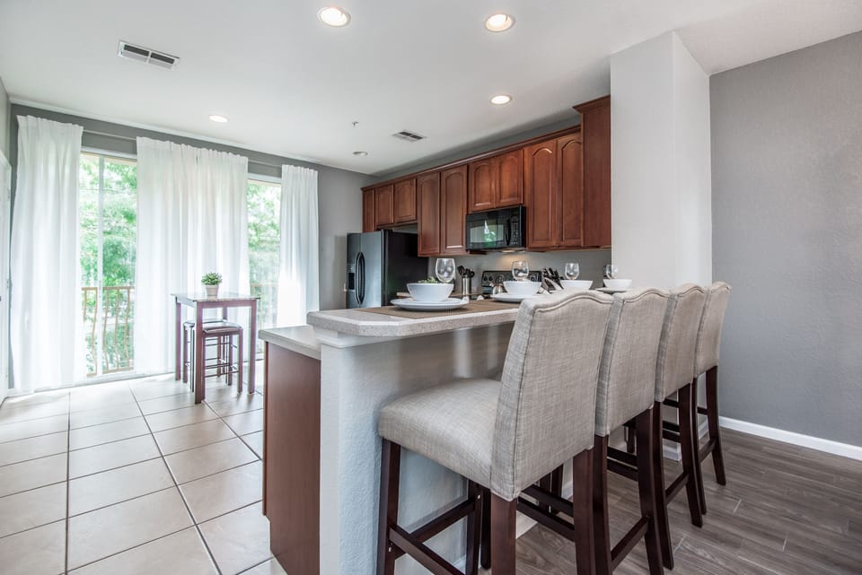 Culinary Haven: Embrace the joy of cooking in our kitchen with a convenient countertop table, a culinary haven for your stay