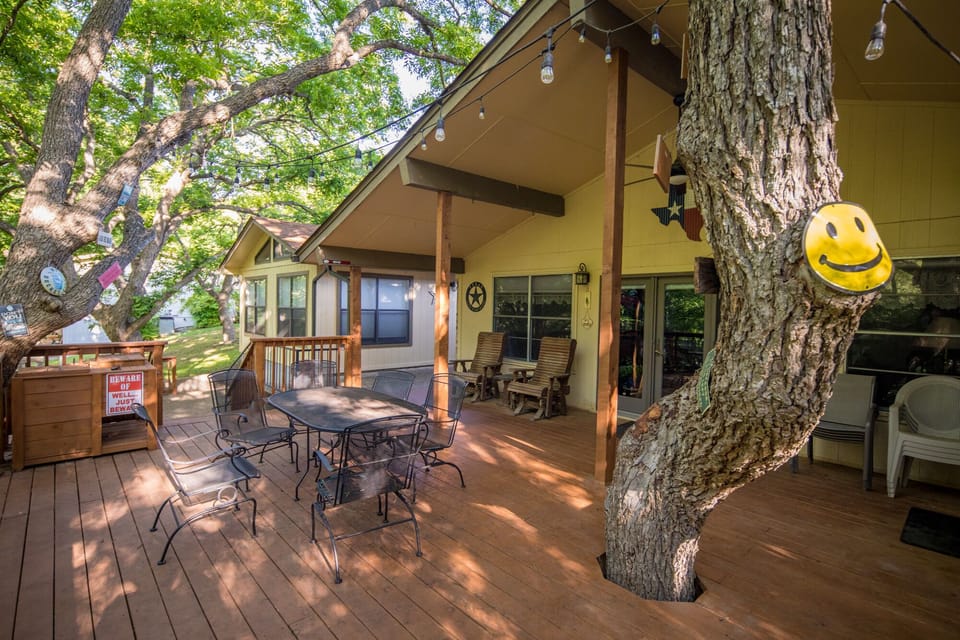Main & guest house share the shady back deck