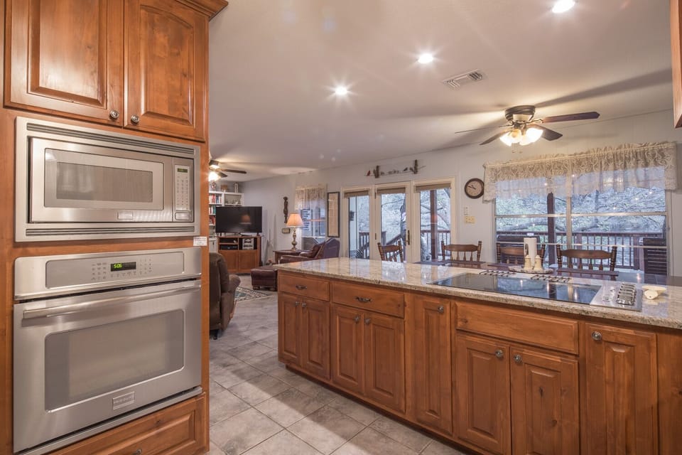 Open kitchen, dining, living areas - opens to back porch
