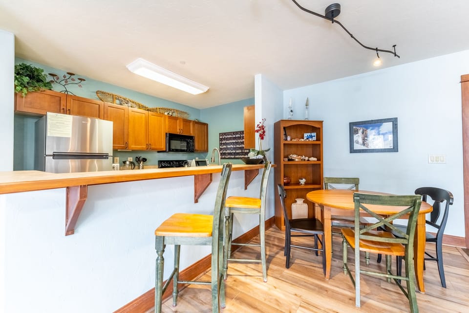 Your open kitchen and dining area creates the perfect space for cooking and sharing meals together, with breakfast bar seating and room for everyone.