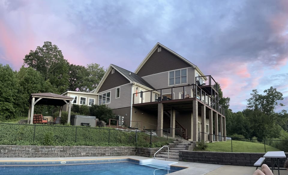 Decks, first gazebo, and hottub with views of the water