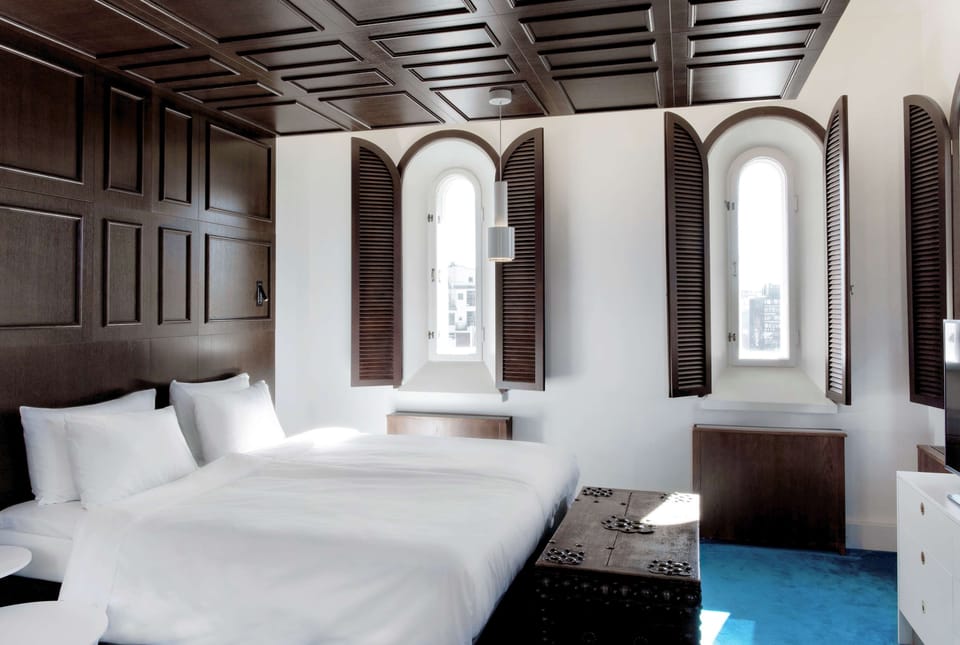 Premium bedding, down comforters, memory foam beds, in-room safe