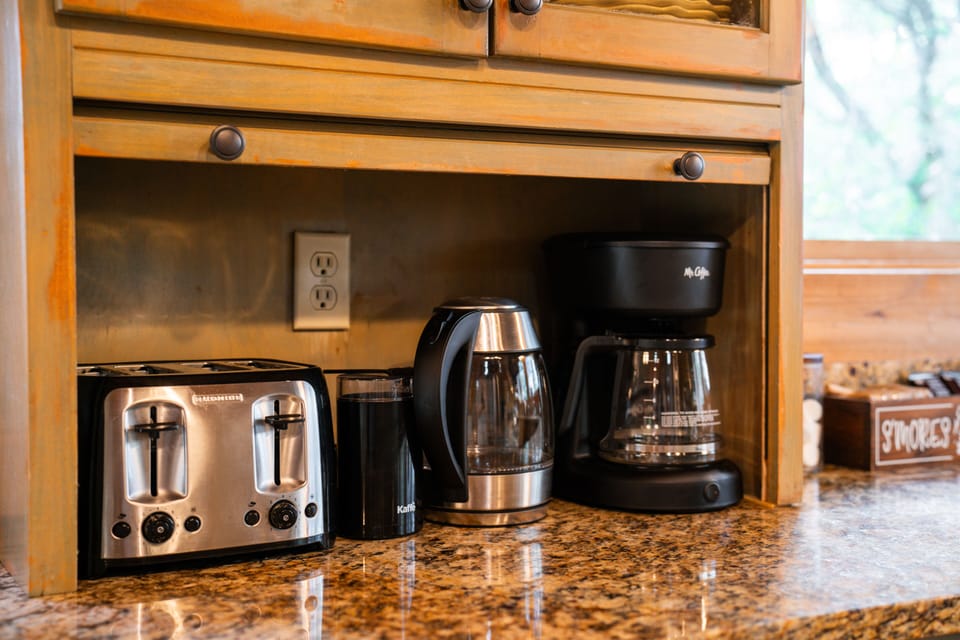 Toaster, coffee bean grinder, tea kettle, coffee maker, French press and Keurig
