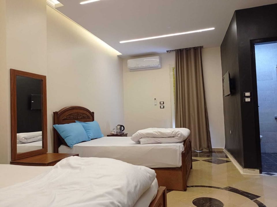 Standard Triple Room | Individually decorated, laptop workspace, blackout drapes, soundproofing