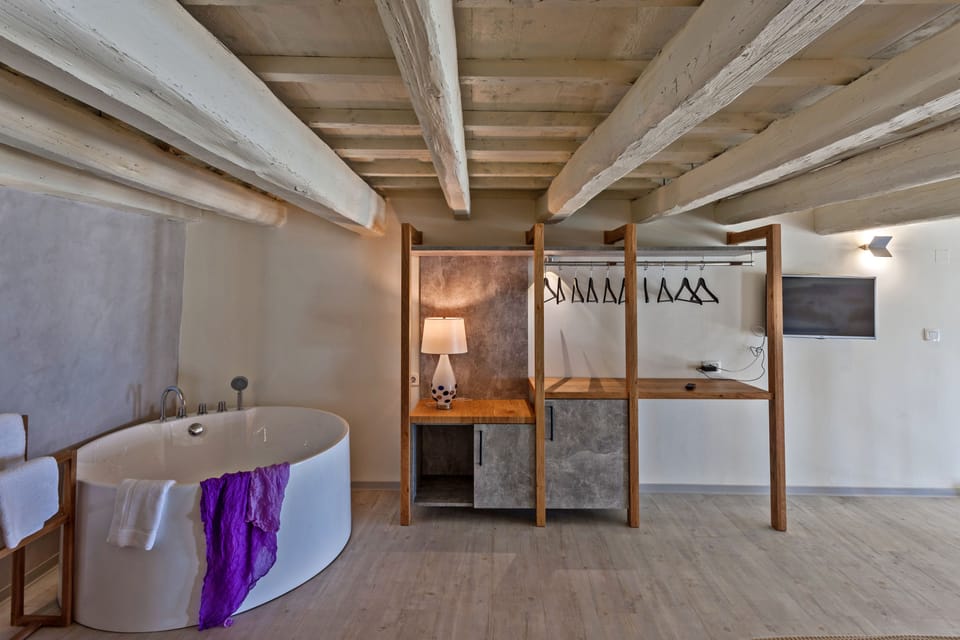 Executive Suite, Sea View (Split Level) | Premium bedding, minibar, in-room safe, individually decorated