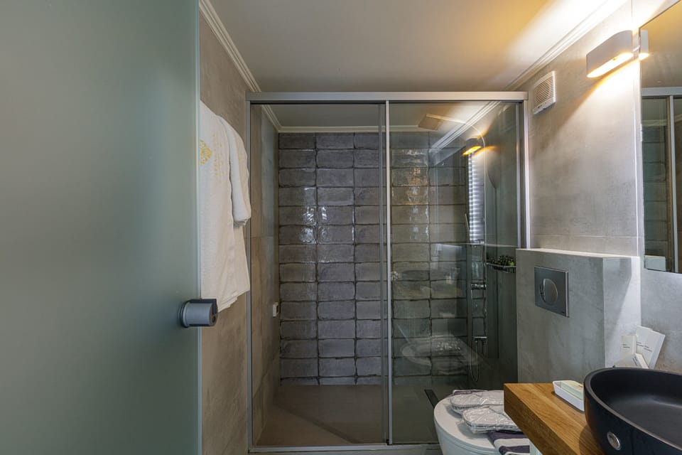 Suite, Partial Sea View (Split Level) | Bathroom | Separate tub and shower, hydromassage showerhead, designer toiletries
