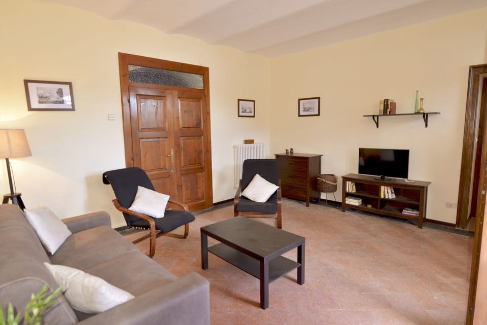 Apartment, 1 Bedroom | Living area | LCD TV