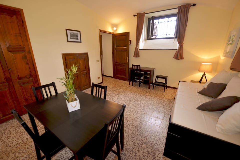 Apartment, 1 Bedroom | Living area | LCD TV
