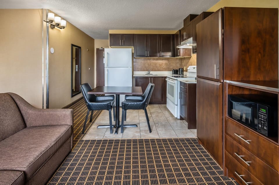 Suite, 1 King Bed with Sofa bed, Non Smoking (Efficiency, Upgrade) | Desk, laptop workspace, soundproofing, iron/ironing board