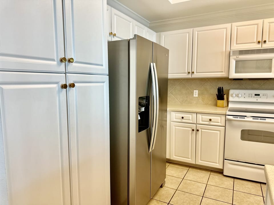 There is a spacious pantry in the kitchen.