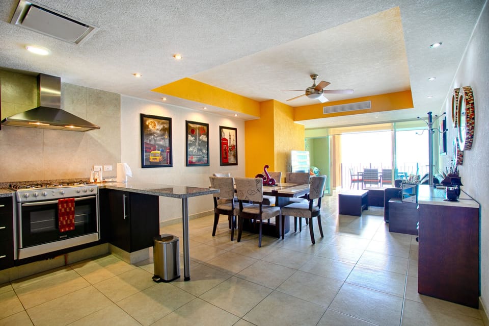 Kitchen, living area and ocean-facing balcony
