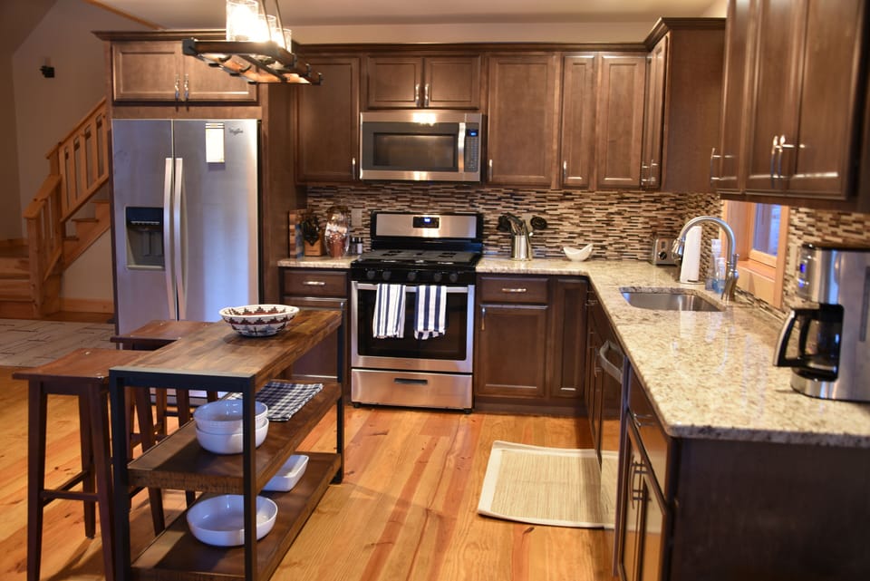Granite countertops, gas stove
