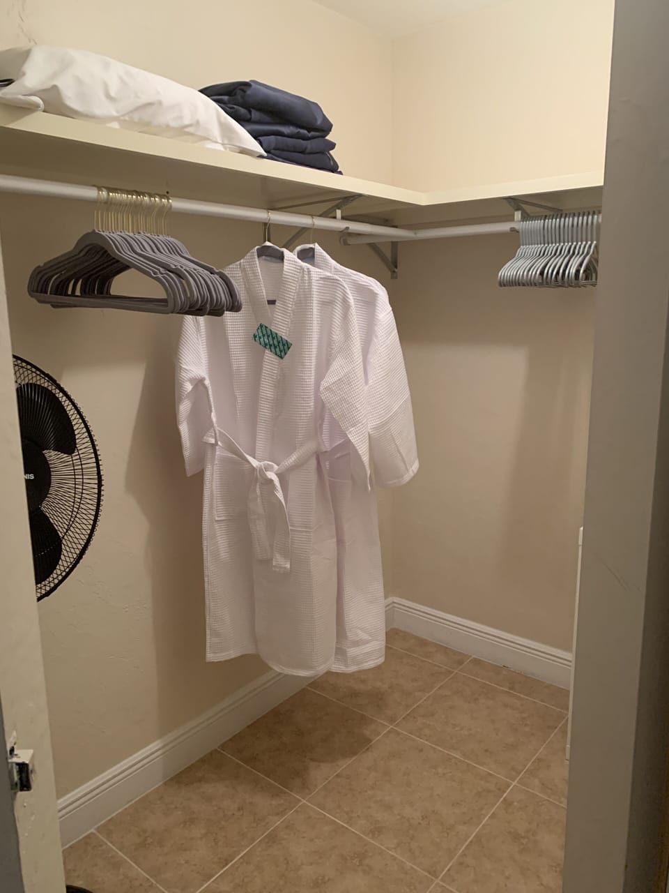 One of the Master Closets:  Fans, Hangers, and Spa Robes are in the closets.