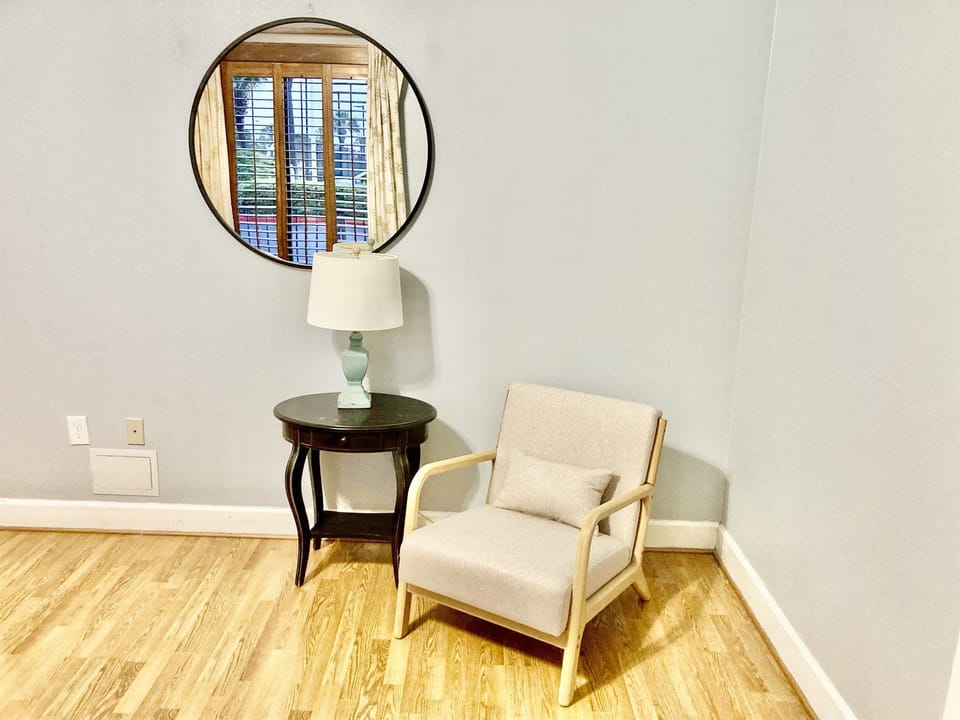 We even have a little sitting area!  The entrance to the master bathroom is to the right of this chair!