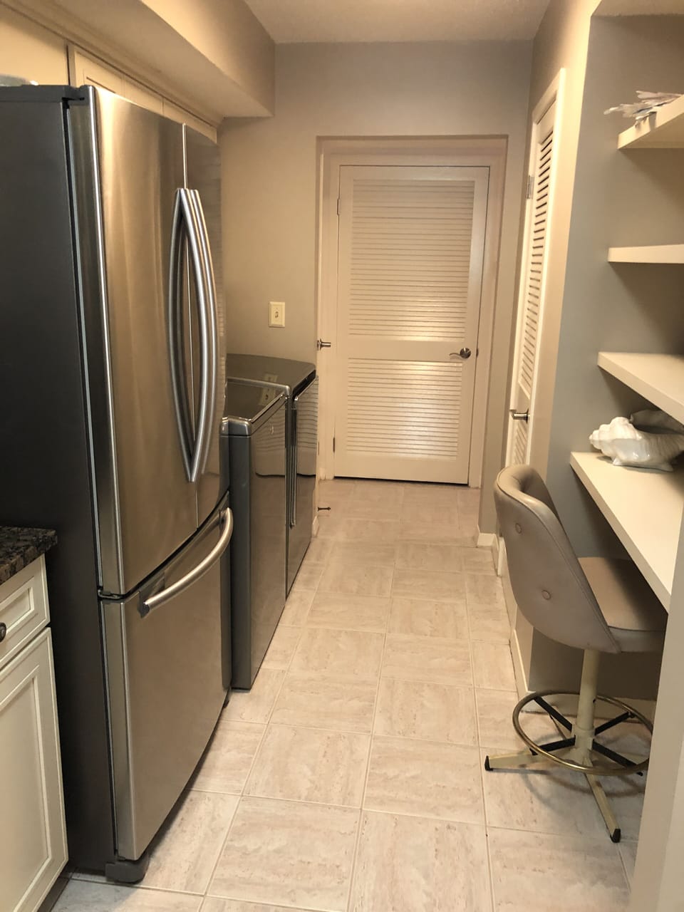 Washer, dryer just off kitchen and pantry area