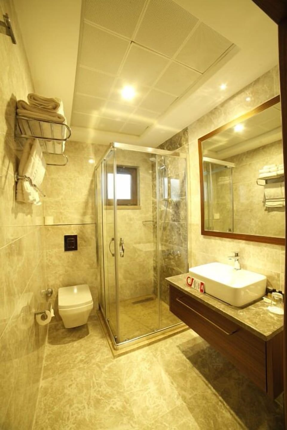 Shower, free toiletries, hair dryer, slippers