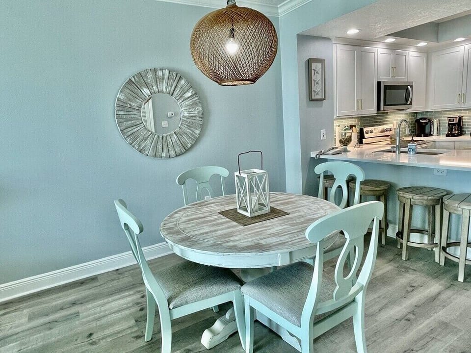Dining table seats four and we also have 4 bar stools at the kitchen counter!