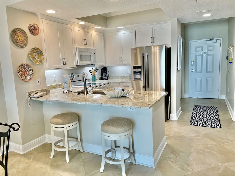 Extra seating at the kitchen bar.  The kitchen is newly renovated and beautiful!