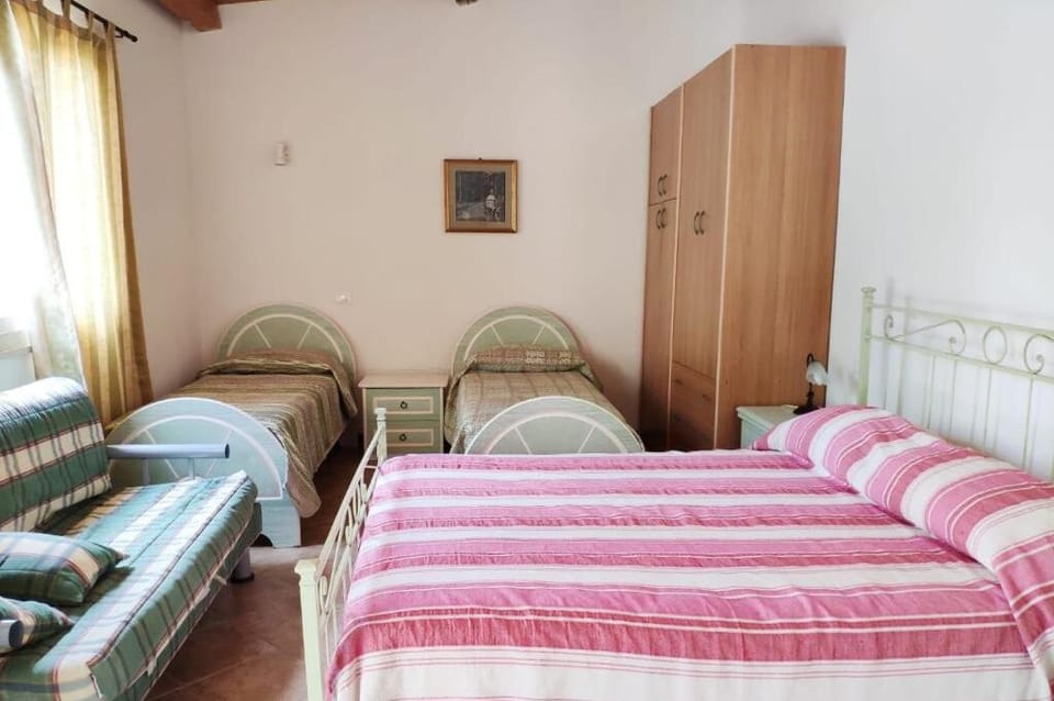 Basic Quadruple Room, Garden View | Desk, iron/ironing board, free WiFi, bed sheets