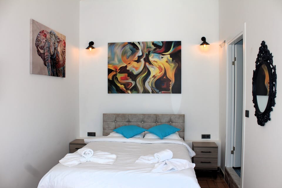 Economy Room, Patio, Garden View | Desk, laptop workspace, blackout drapes, soundproofing