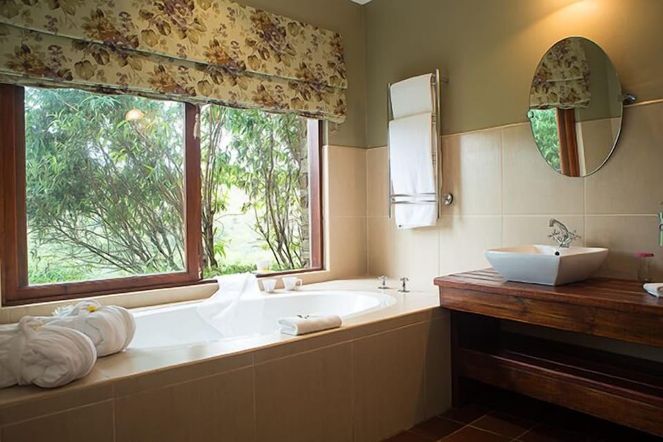 Designer toiletries, hair dryer, bathrobes, slippers