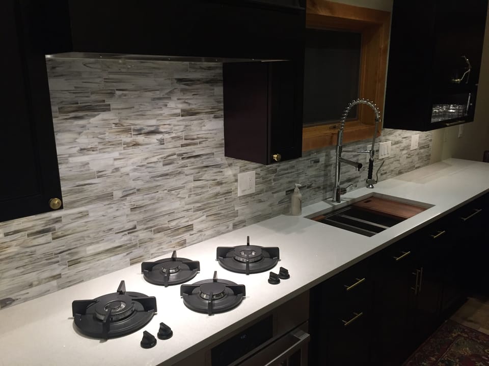 Gas cook top integrated into the quartz counters.