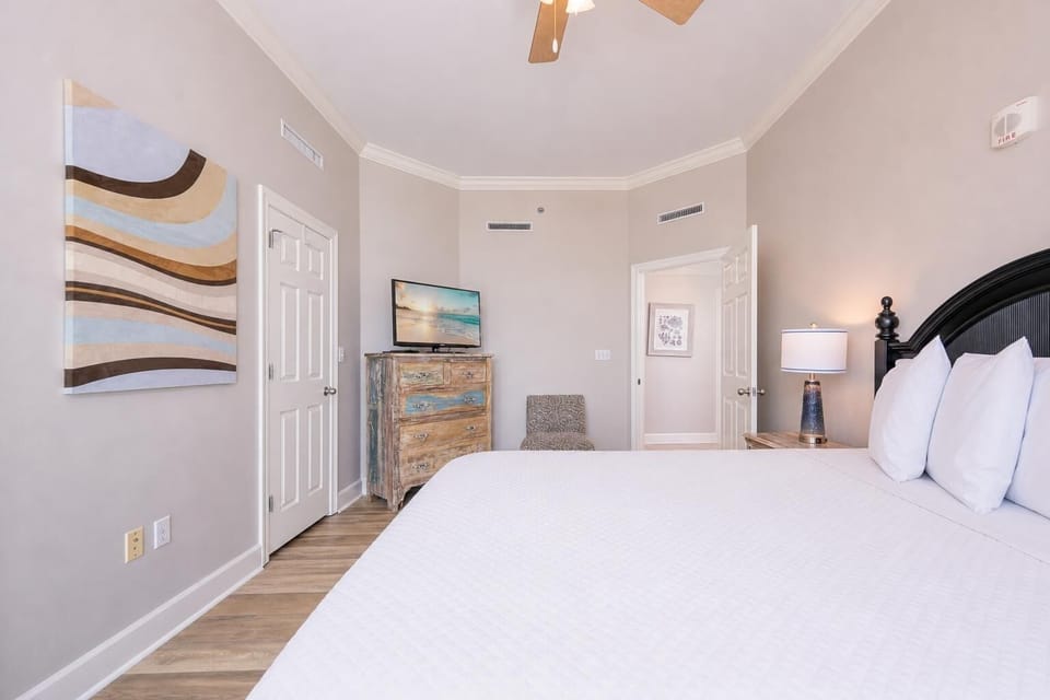 A peaceful queen guest suite lets you unwind with soft linens and streaming your favorite shows