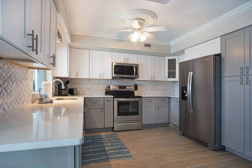 New kitchen Nov 2022 stainless & quartz countertops 