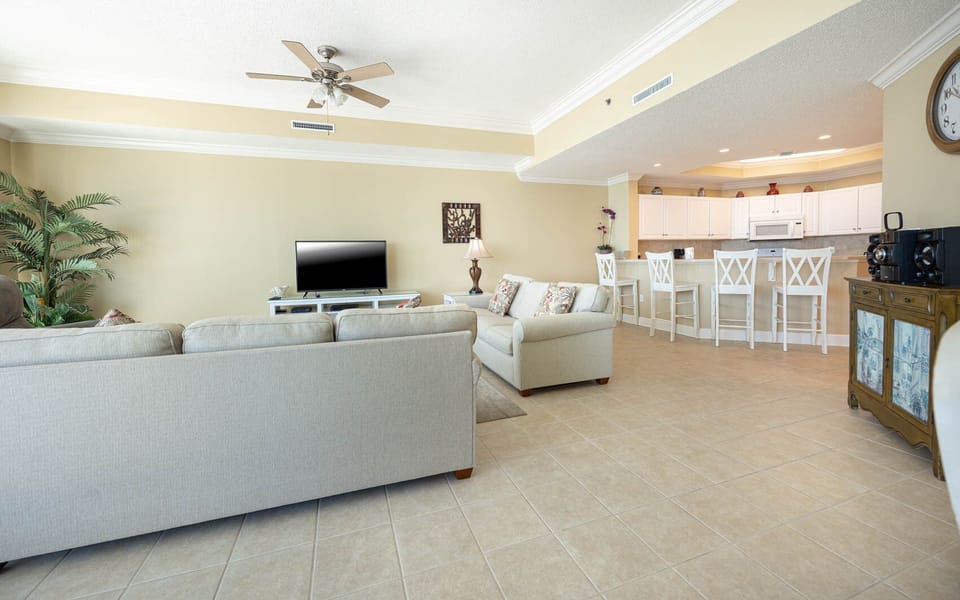 Unwind with loved ones in the family room, equipped with a queen sofa sleeper, and enjoy the view