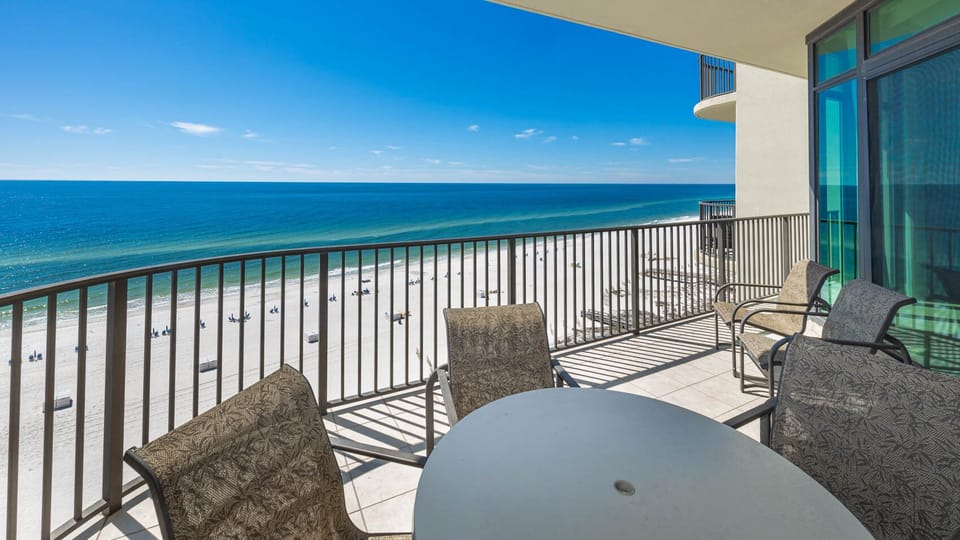 Relax on your balcony, soaking in the stunning coastal views and refreshing sounds of waves crashing below