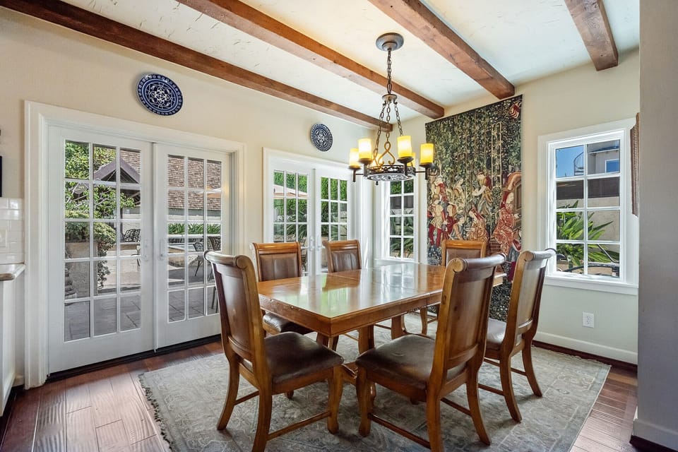 Dining table next to kitchen