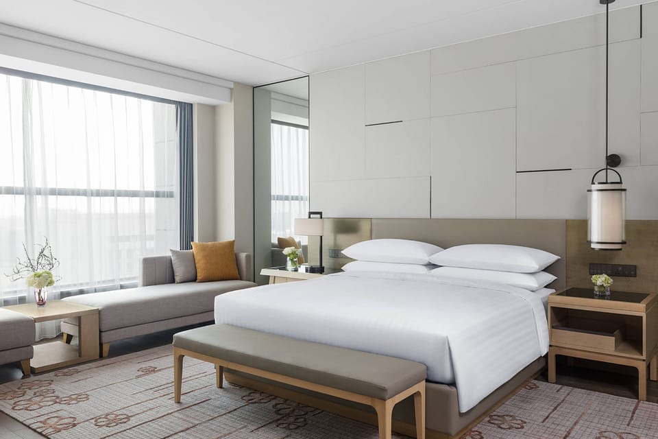 Club Suite, 1 Bedroom | Down comforters, in-room safe, desk, soundproofing