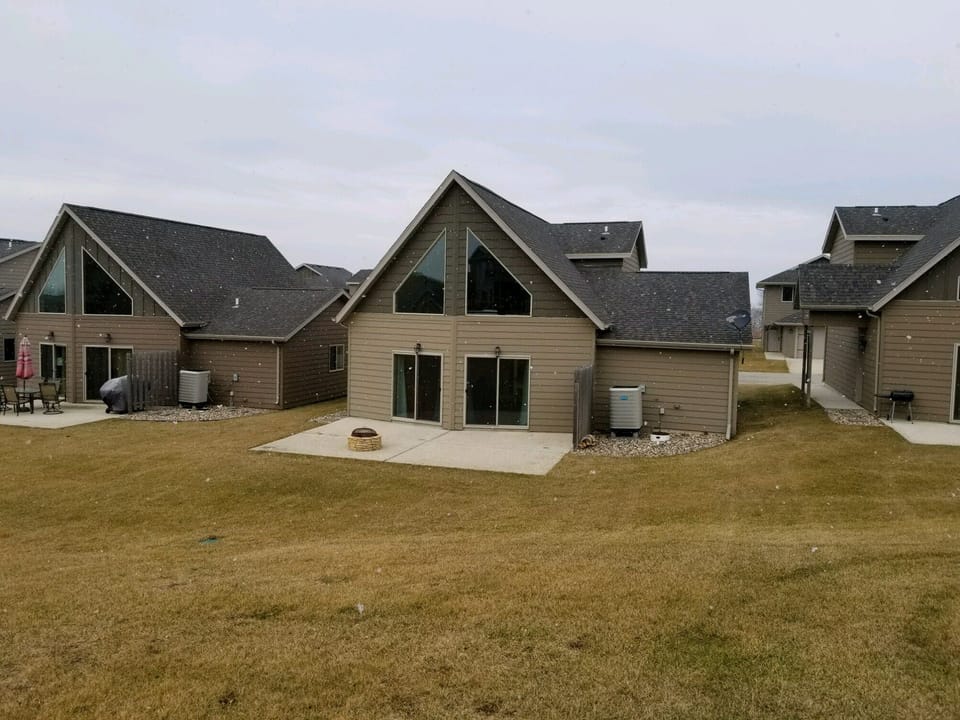 BACKYARD, FIREPIT AND PATIO FURNITURE ARE PROVIDED. 