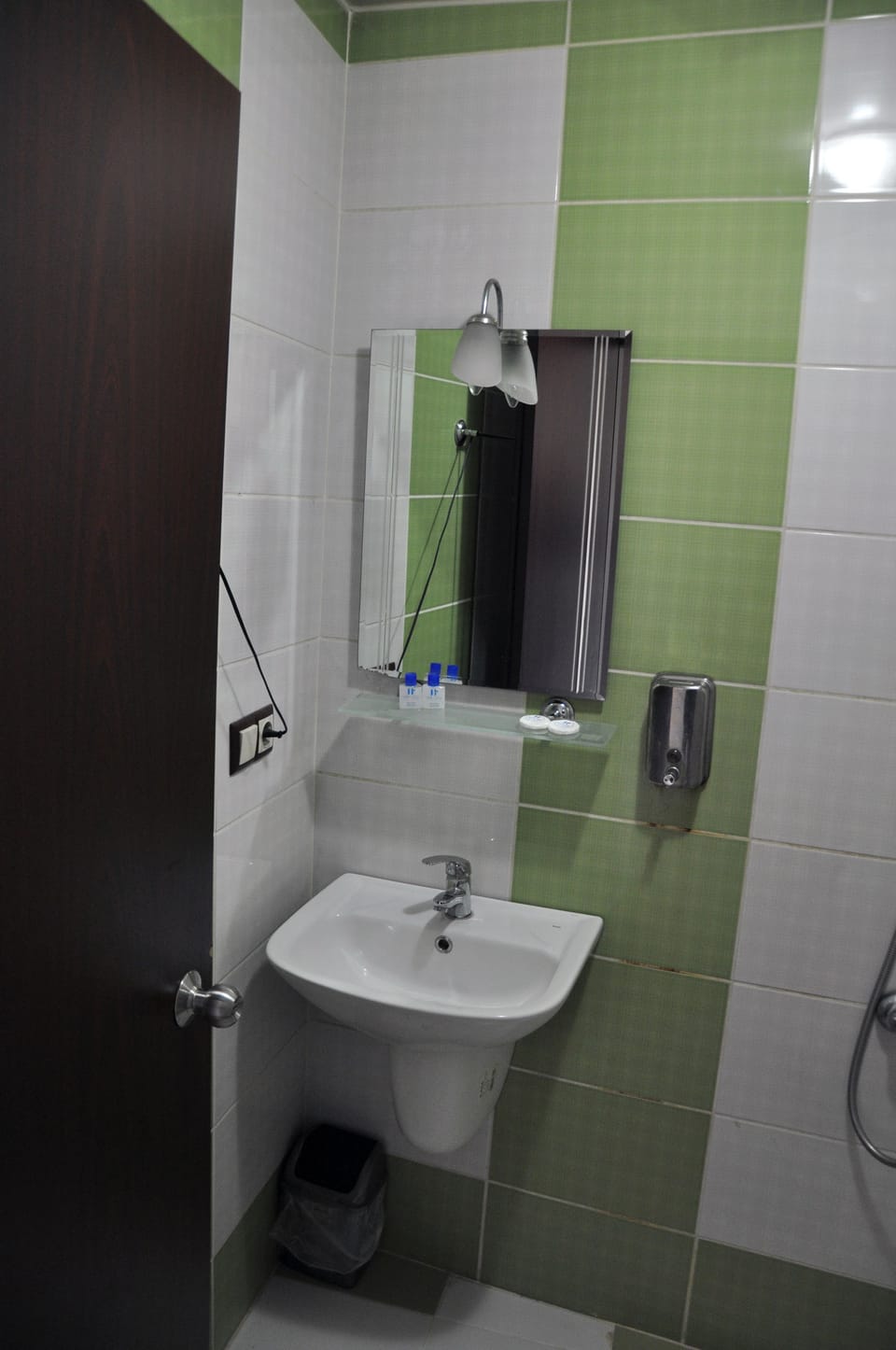 Shower, free toiletries, hair dryer, slippers