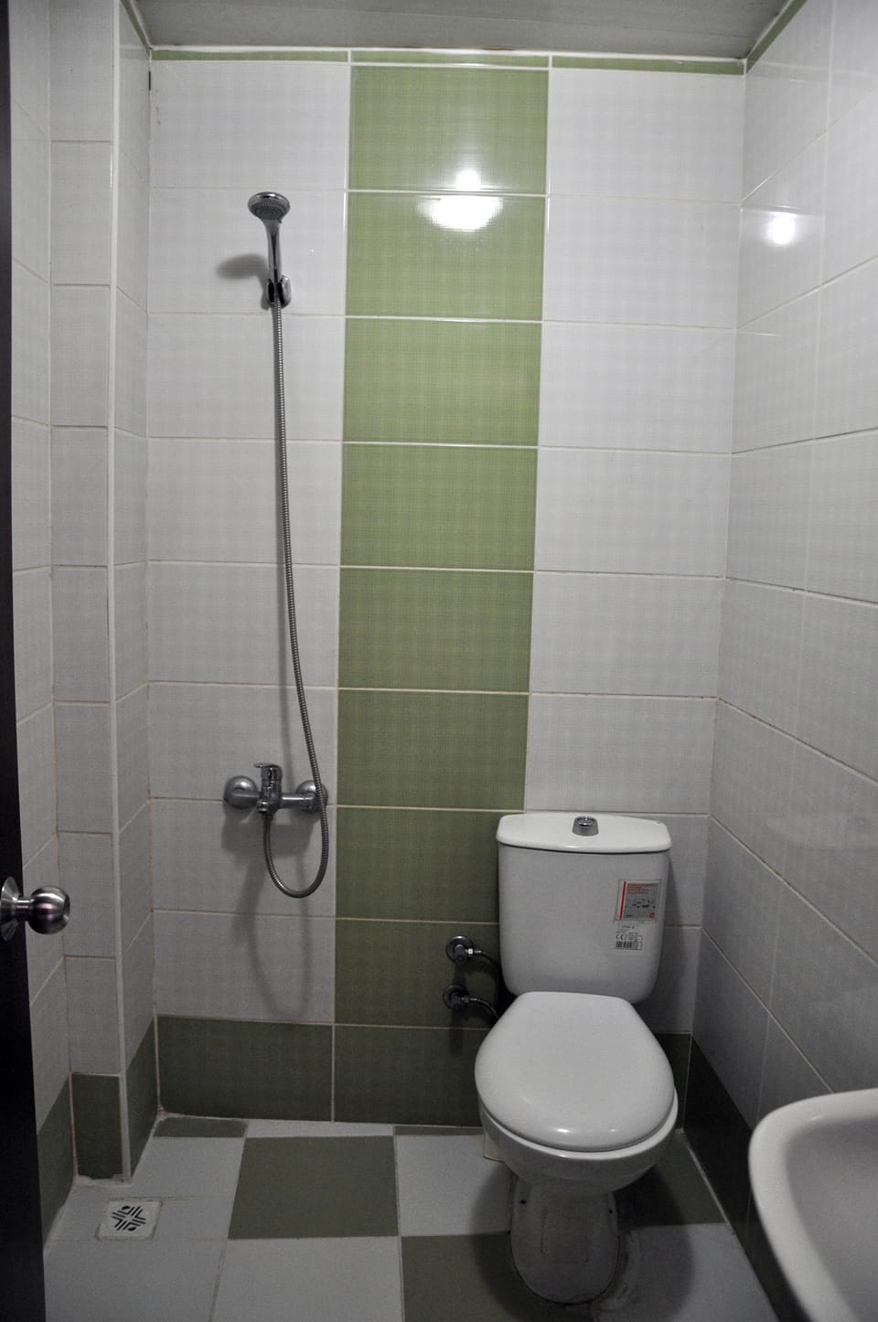 Shower, free toiletries, hair dryer, slippers
