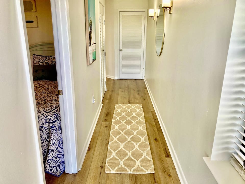As you enter, the guest bedroom is directly on the left...