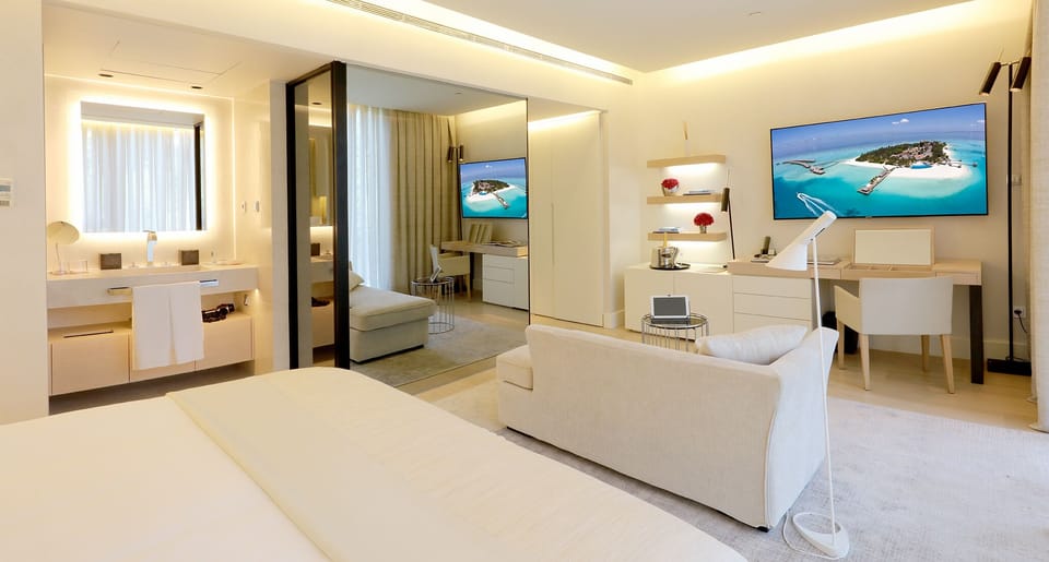 Premium bedding, down comforters, pillowtop beds, minibar