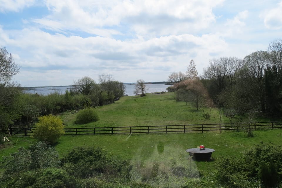 back garden leads  down to the lake shore. 