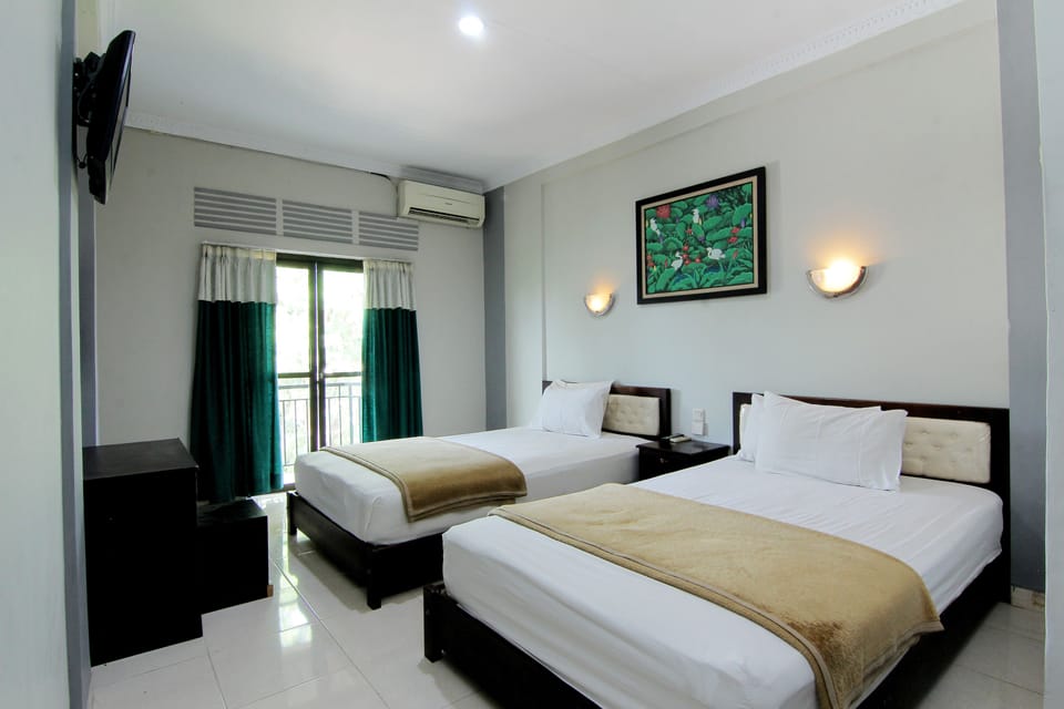 Family Room | Premium bedding, desk, free WiFi
