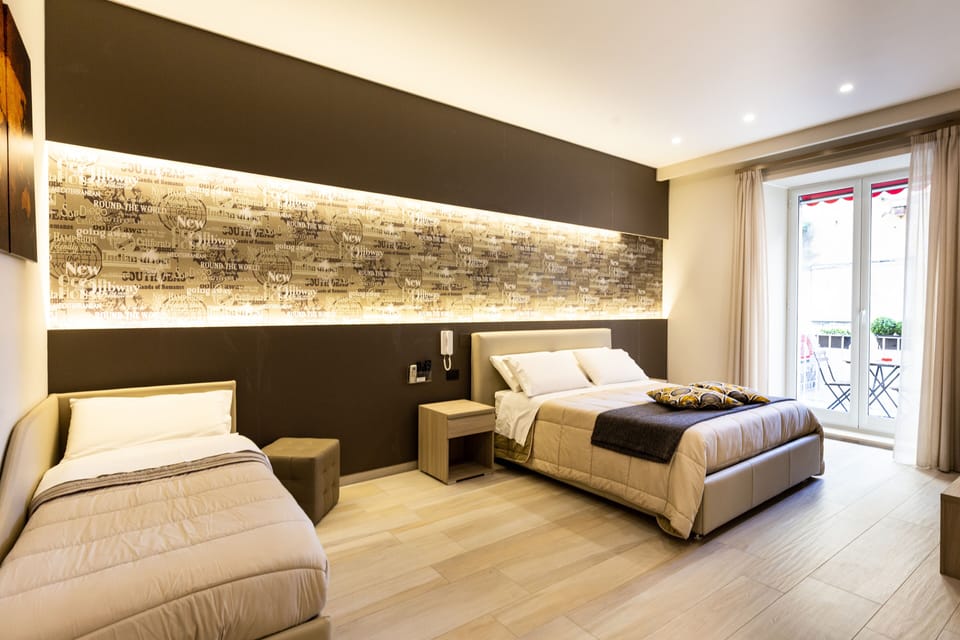 Comfort Quadruple Room | Premium bedding, in-room safe, desk, soundproofing