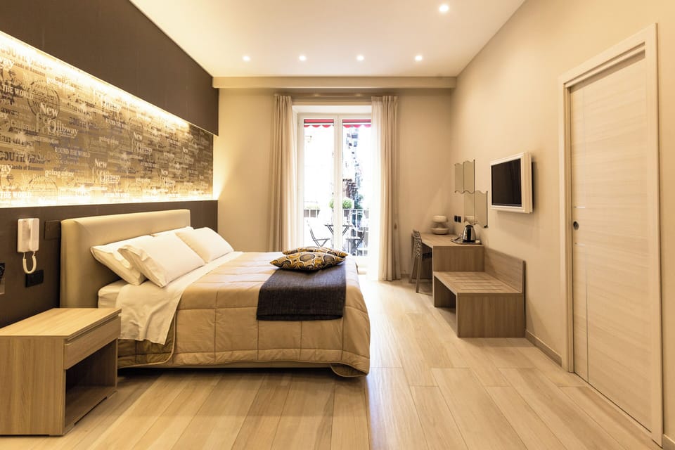 Comfort Quadruple Room | Premium bedding, in-room safe, desk, soundproofing