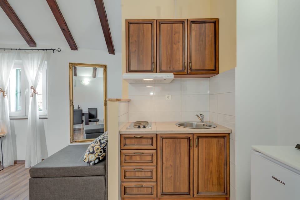 Studio Apartment, City View | Private kitchen | Fridge, coffee/tea maker, electric kettle