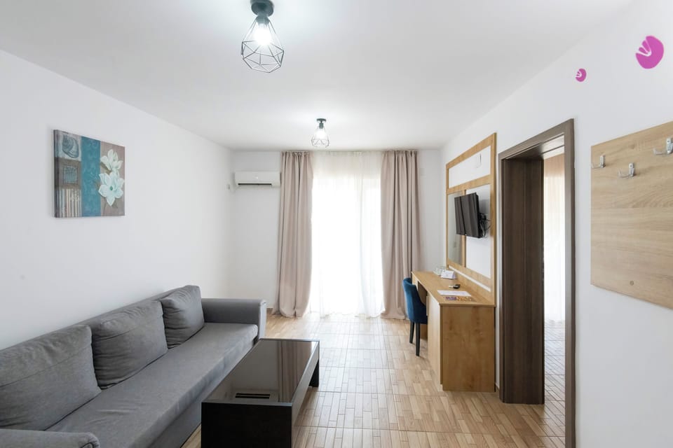 Superior Suite, 1 Queen Bed with Sofa bed | Living area | LED TV