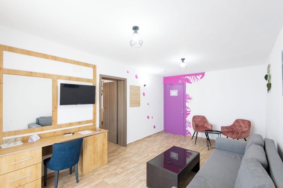 Superior Suite, 1 Queen Bed with Sofa bed | Living area | LED TV