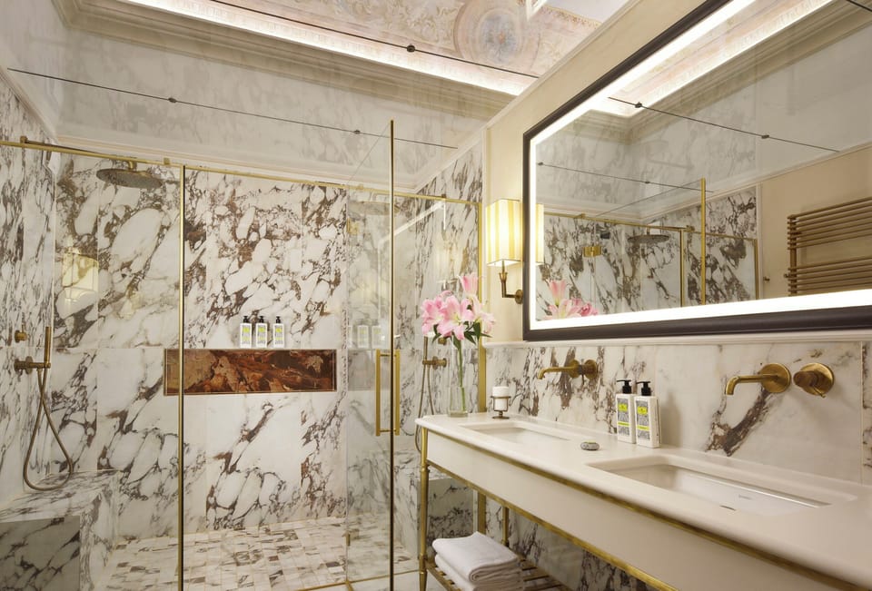 Signature Suite | Bathroom | Free toiletries, hair dryer, slippers, bidet