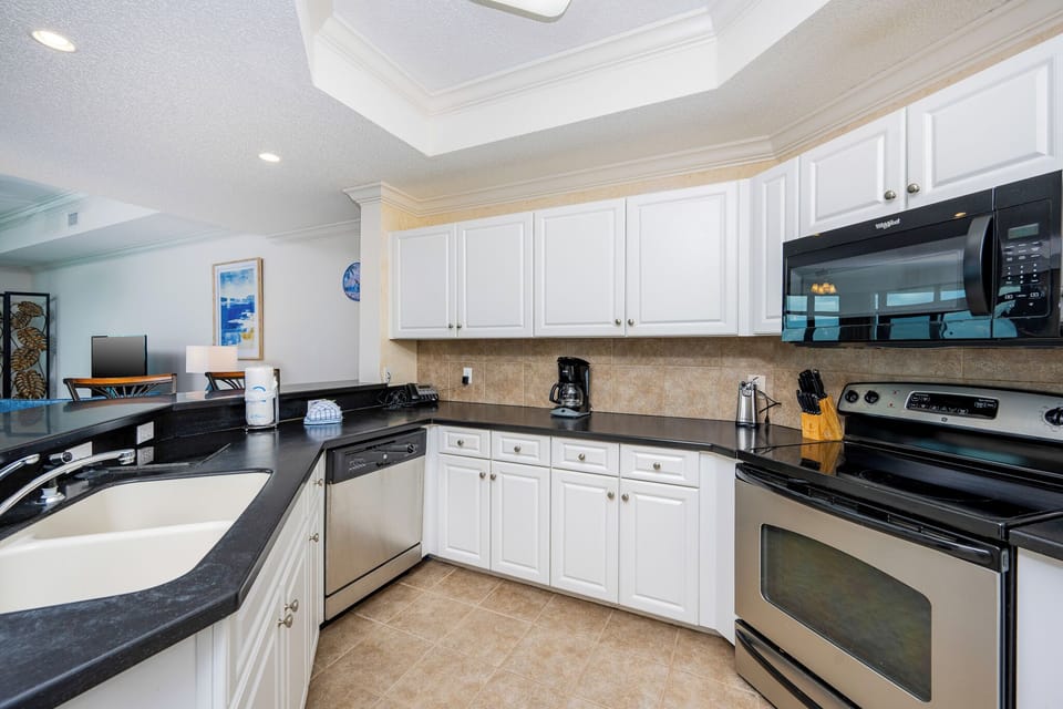 Enjoy a leisurely morning brewing coffee at your kitchen counter while soaking in the cheerful beach vibe