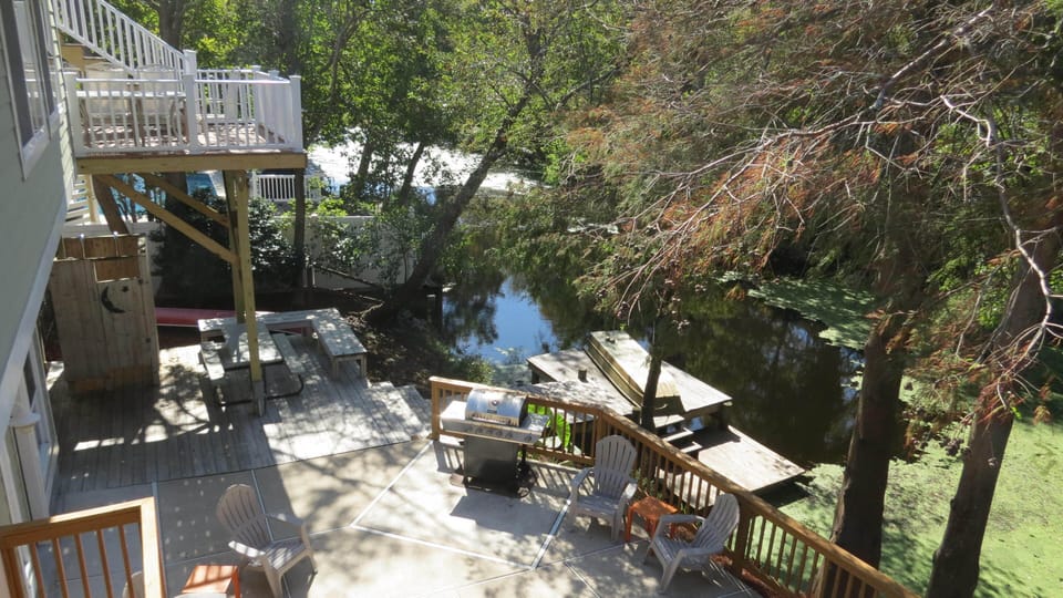 View from upstairs master king bedroom porch over looking the pool.