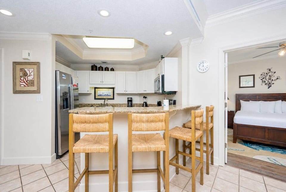 Sip your morning coffee at the breakfast bar and get ready for a day of adventure in this stylish space